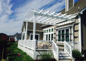 Wood vs. Vinyl: Why a Custom Vinyl Pergola is your Best Bet